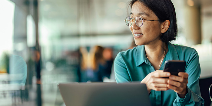 Independent Travel Agents - female travel agent working on laptop