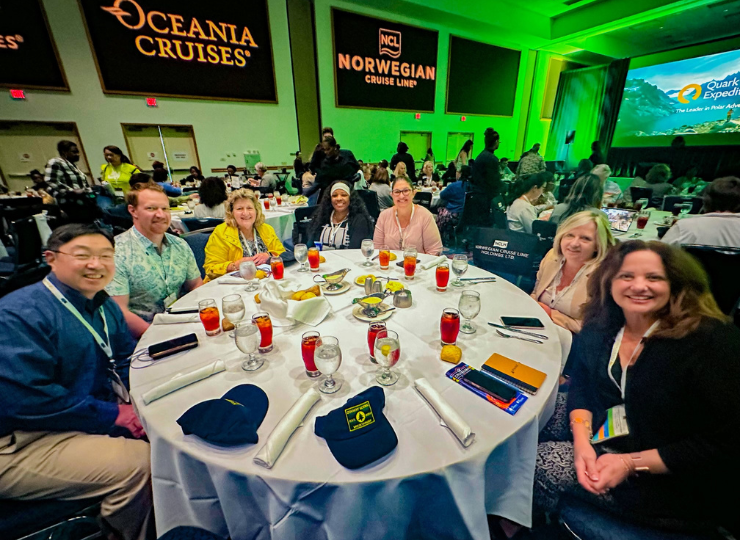 group of travel advisors at welcome general session lunch at Cruise 360